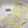 White Cannabis Socks with yellow Cannabis Leafs